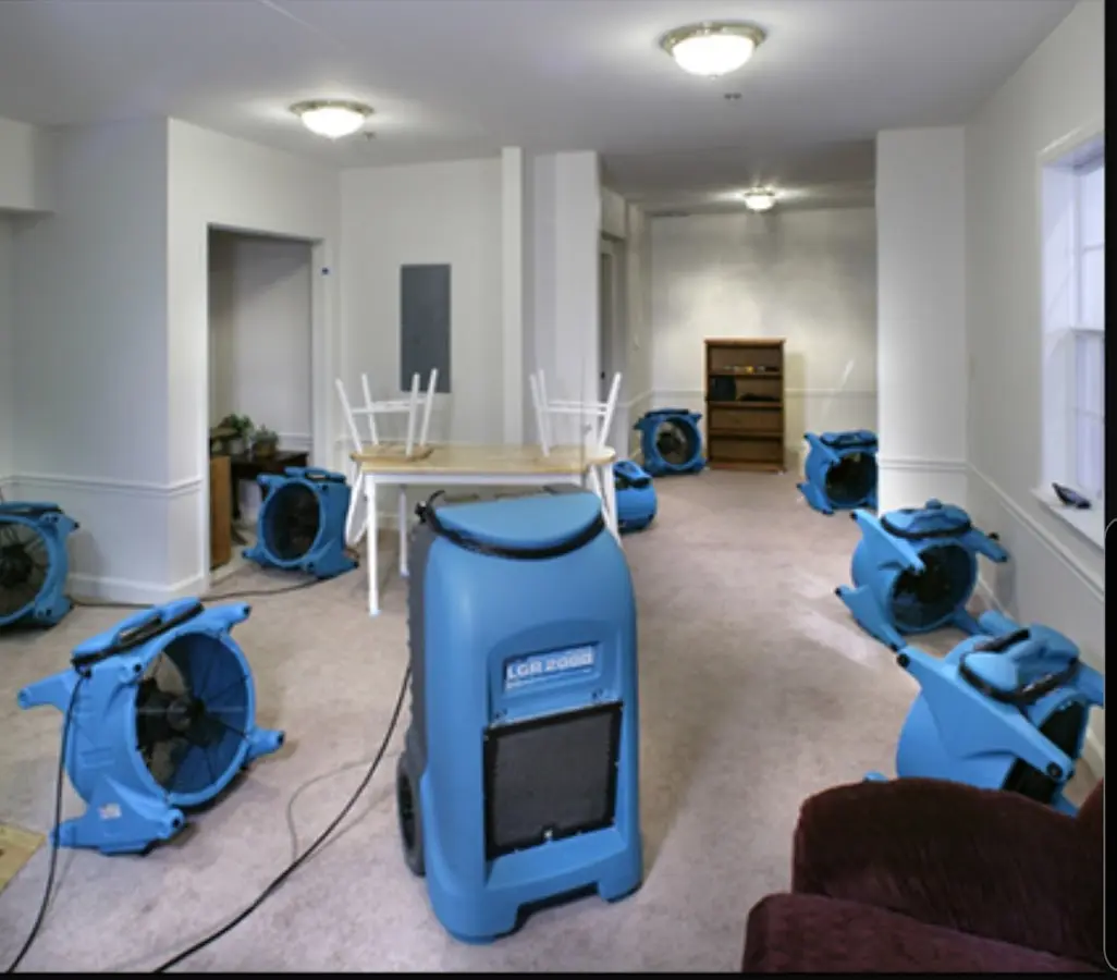 Air movers and dehumidifier setup for Water Damage Restoration in Canton
